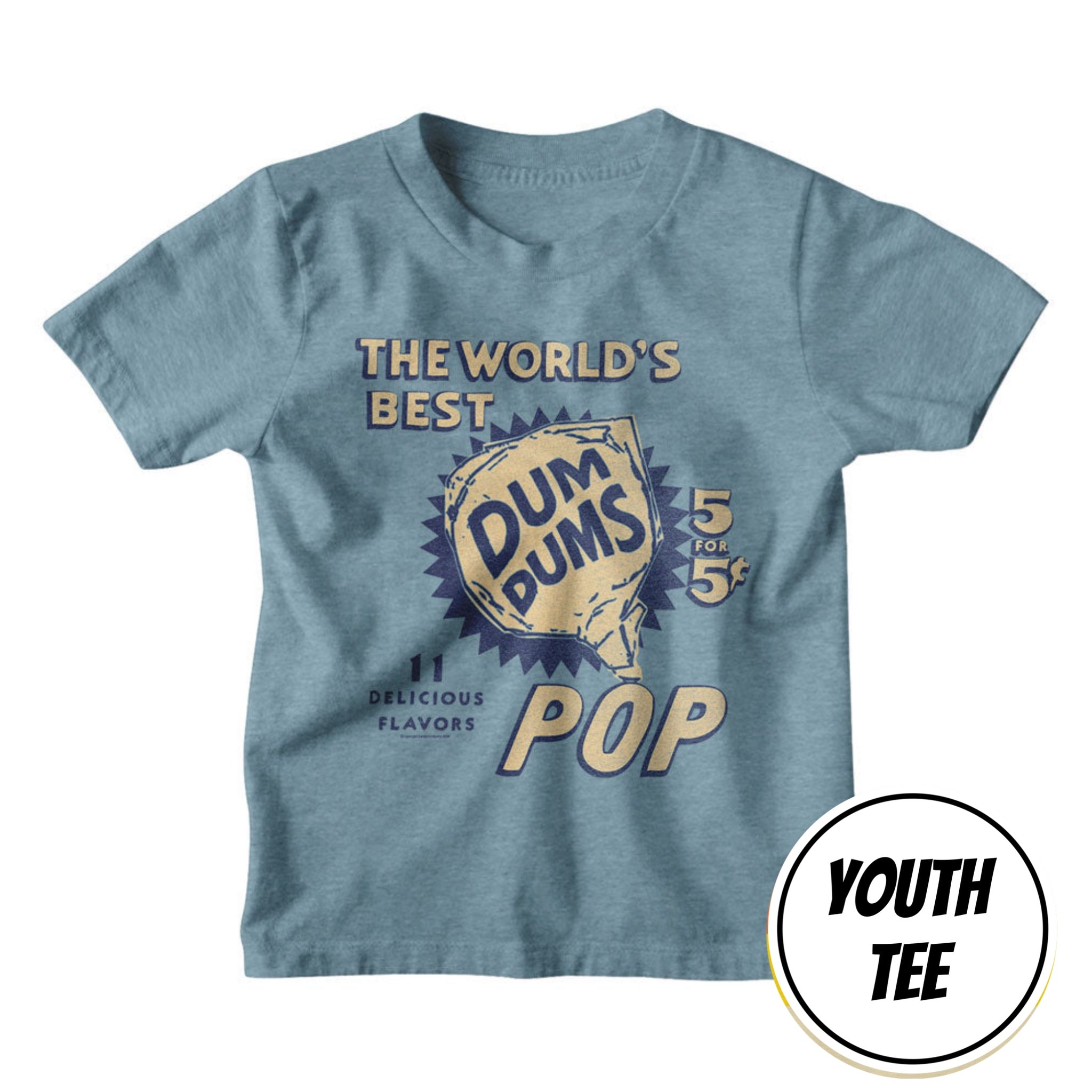 A youth heather blue t-shirt featuring a vintage-style 'Dum Dums Pop' graphic on the front. The graphic includes a gold and blue bottle illustration with the text 'THE WORLD'S BEST DUM DUMS POP' and '11 DELICIOUS FLAVORS'.