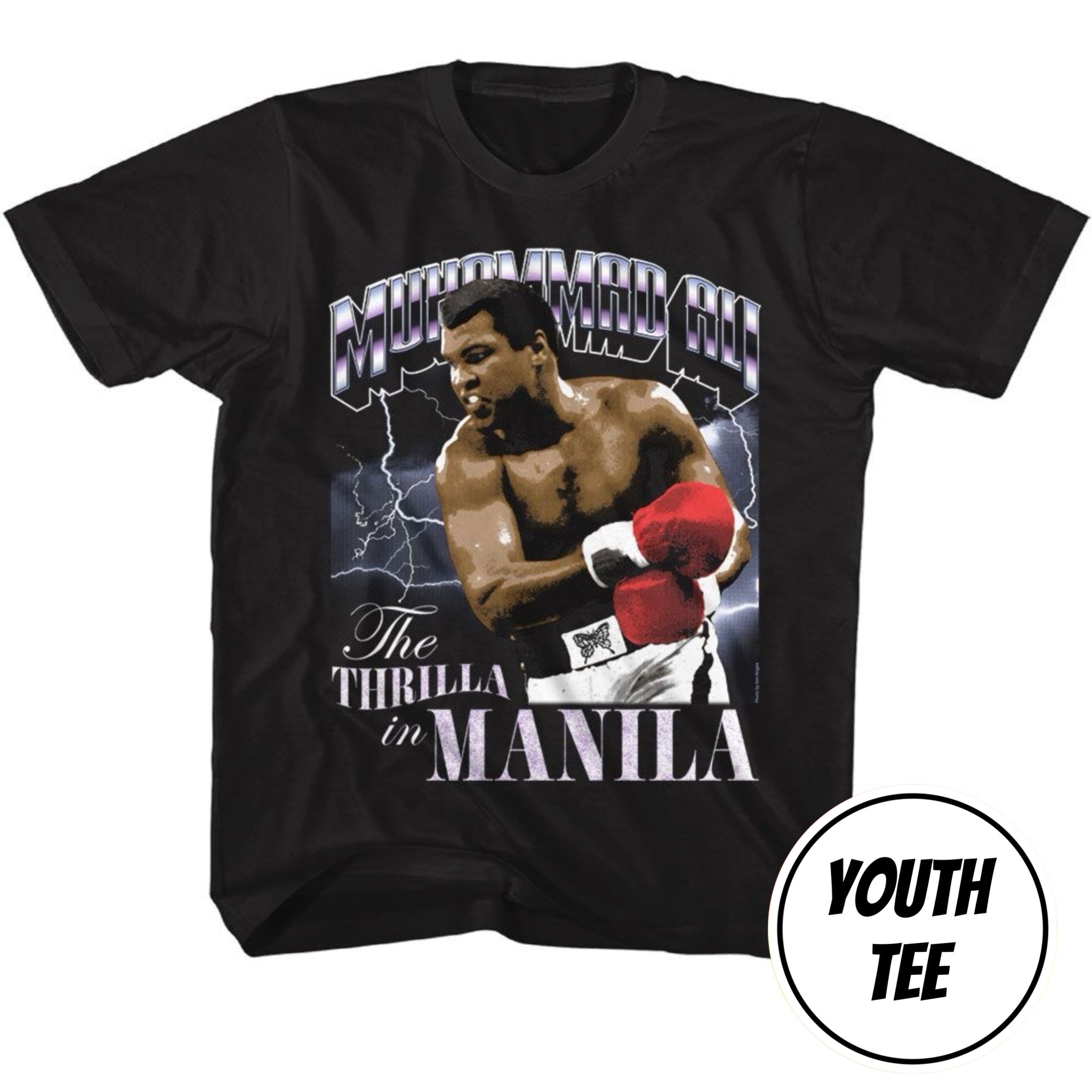 A black short-sleeve graphic t-shirt featuring a printed image of boxer Muhammad Ali with the text 'MUCHAMARD ALI' and 'The Thrilla in MANILA'. A white circular badge in the bottom right corner reads 'YOUTH TEE'.
