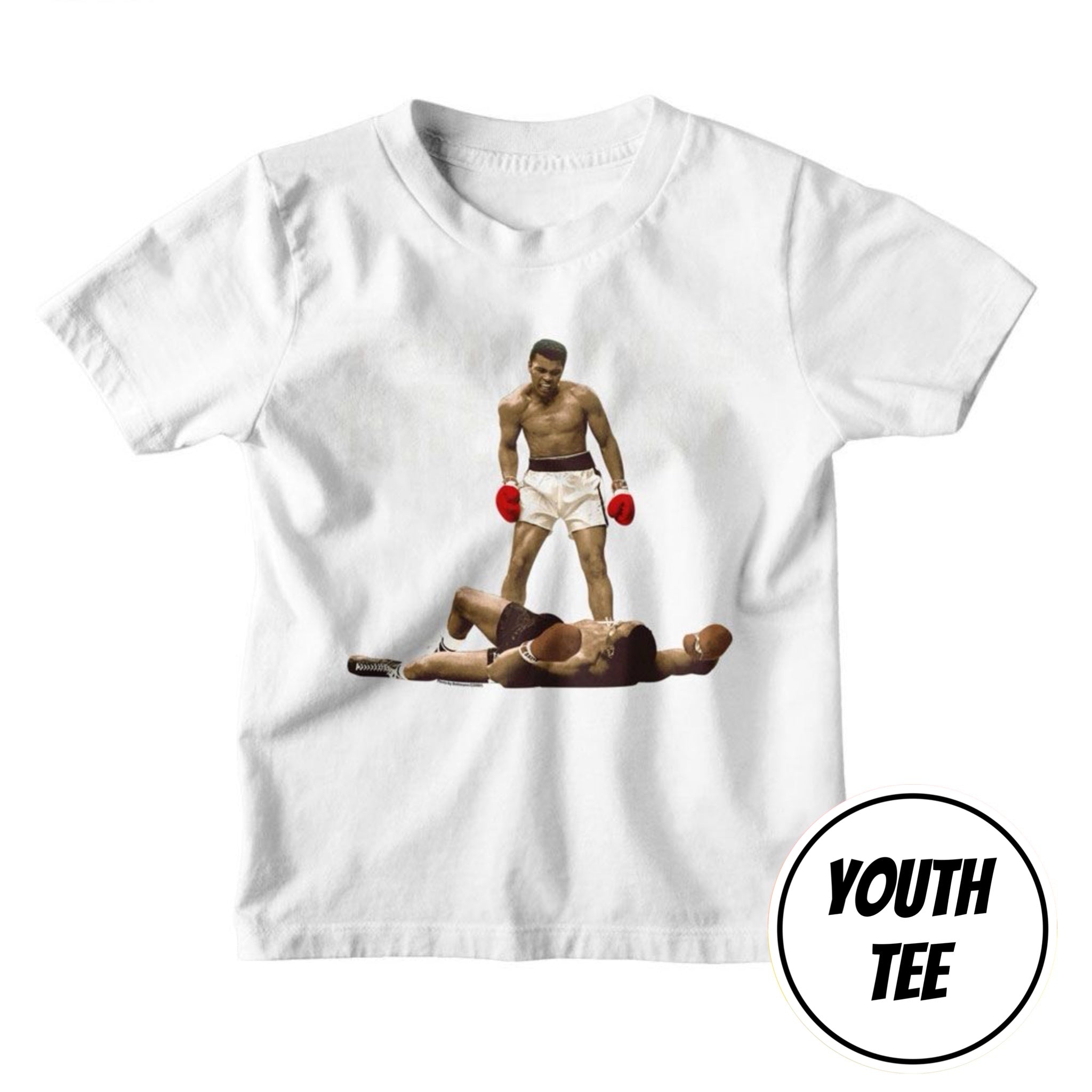 A white youth t-shirt featuring a graphic print of boxer Muhammad Ali standing over a fallen opponent, with red boxing gloves. A circular 'YOUTH TEE' label is visible in the bottom right corner.