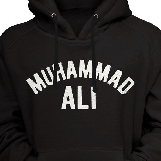 Black hoodie with 'Muhammad Ali' printed on it against a black background