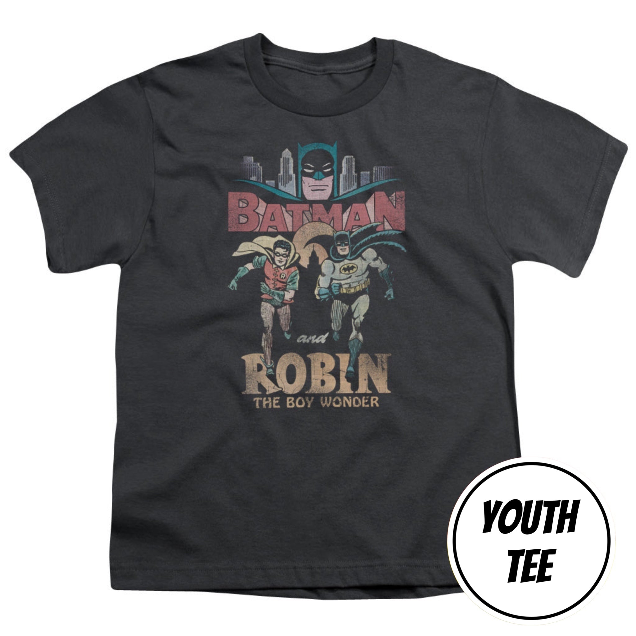 A youth charcoal gray t-shirt featuring a retro-style graphic of Batman and Robin with the text 'BATMAN and ROBIN THE BOY WONDER'. A white circular badge in the bottom right corner reads 'YOUTH TEE'.
