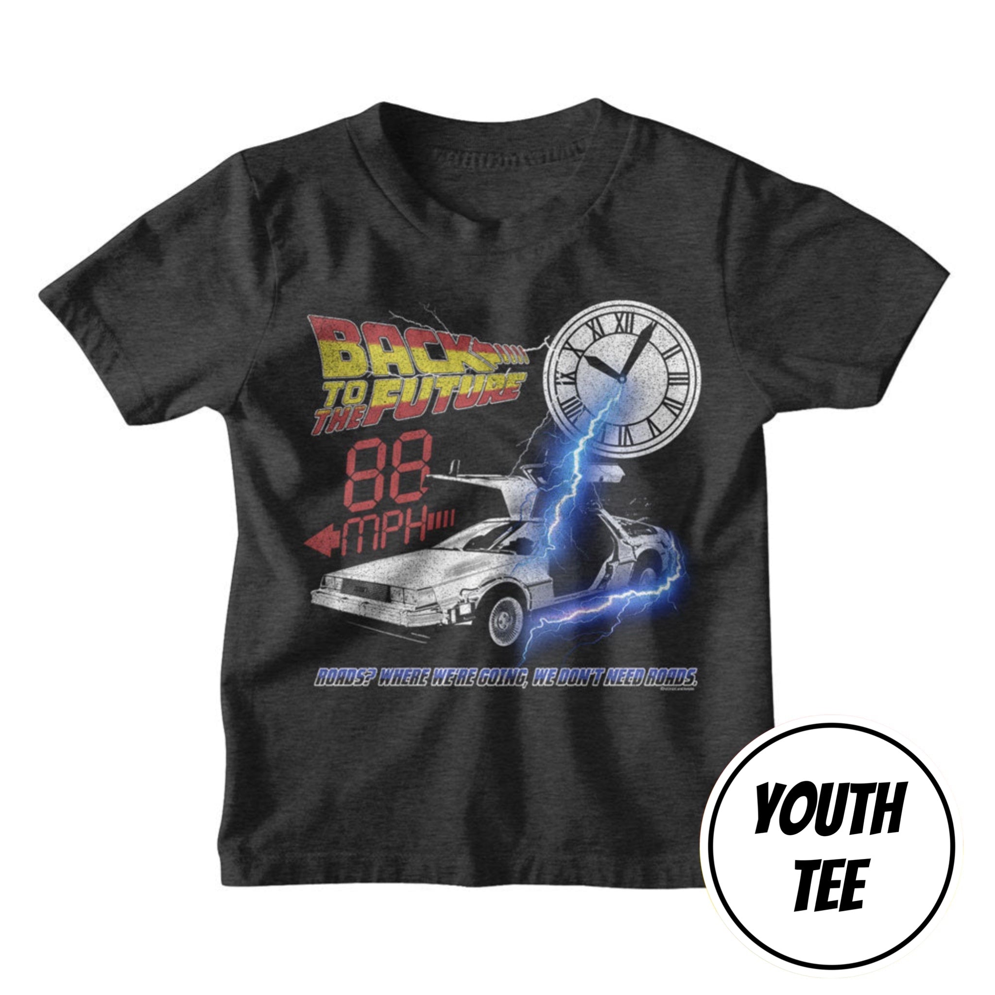 A youth heather black t-shirt featuring a 'Back to the Future' DeLorean graphic with a clock, lightning, and red '88 MPH' text. A white circular badge in the bottom right corner reads 'YOUTH TEE'.