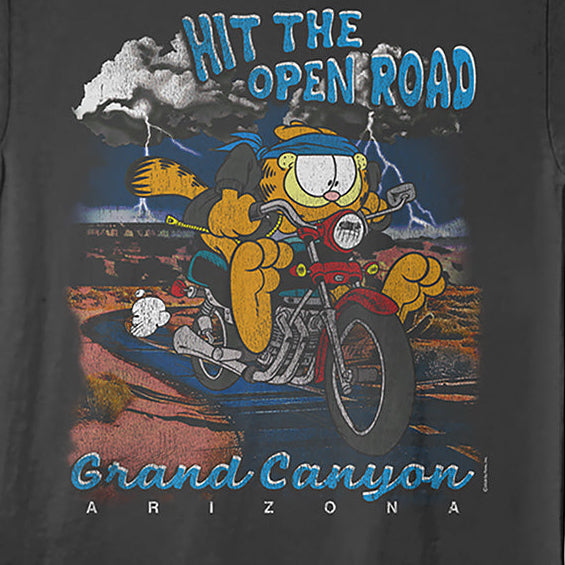 A dark charcoal gray graphic t-shirt featuring Garfield riding a motorcycle in the Grand Canyon with the text 'HIT THE OPEN ROAD' and 'Grand Canyon ARIZONA'.