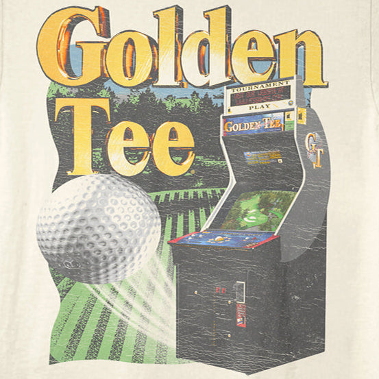 An off-white short-sleeve t-shirt featuring a retro graphic print of a golf ball, a vintage arcade machine, and the text 'Golden Tee'.
