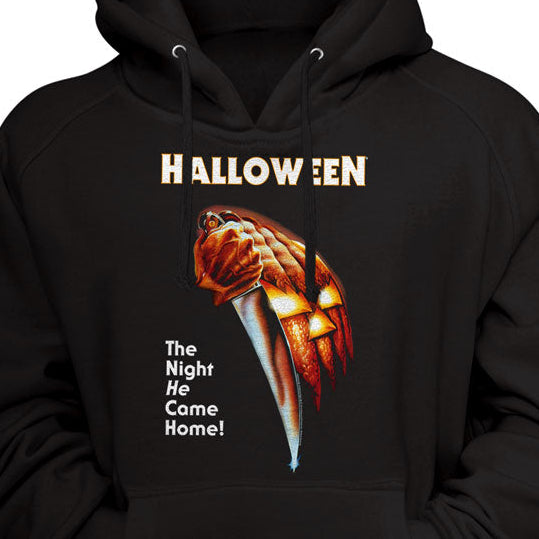 Black hoodie with Halloween-themed design featuring a skeleton hand and text on a black background