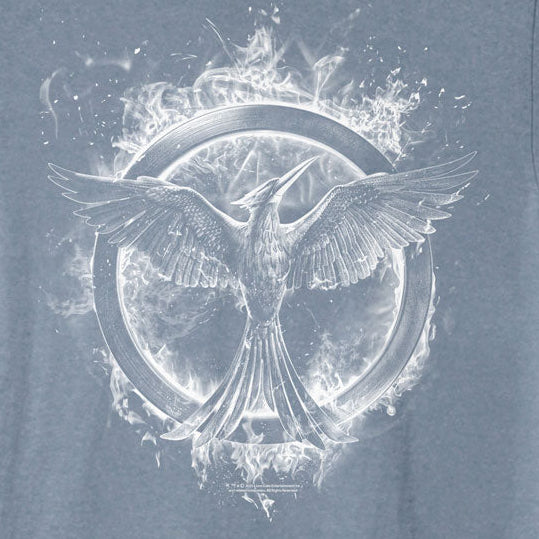 A heathered slate blue short-sleeve t-shirt featuring a large white graphic print of the Mockingbird logo from The Hunger Games series on the front, set against a plain white background.
