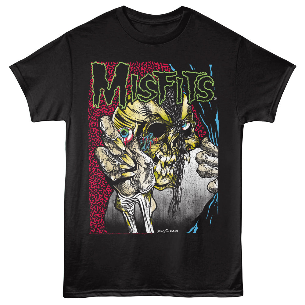 Black t-shirt with a graphic design of a skeleton hand holding a skull and the Misfits logo.