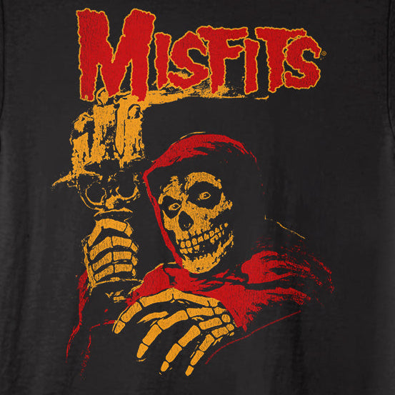 Black t-shirt with a graphic design of a skeleton in a red hood and the word 'Misfits' in red above it on a black background.