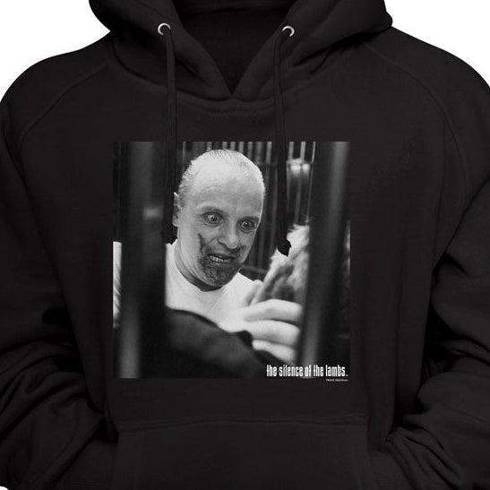 A black pullover hoodie with a front kangaroo pocket and a square black-and-white graphic print on the chest showing a man behind bars with the text 'no choice left but to.