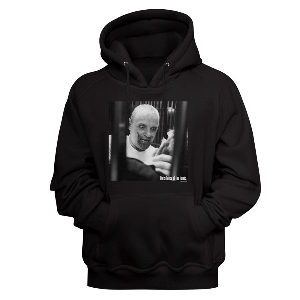 A black pullover hoodie with a front kangaroo pocket and a square black-and-white graphic print on the chest showing a man behind bars with the text 'no choice left but to.