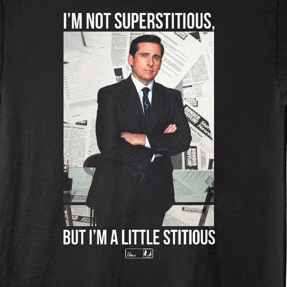 Black t-shirt with a graphic of a man in a suit and text on a black background