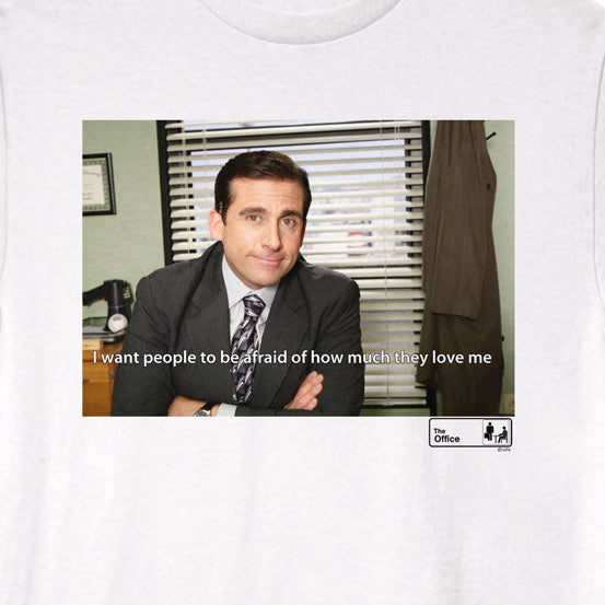 White t-shirt with a graphic of a man in a suit and text, on a white background