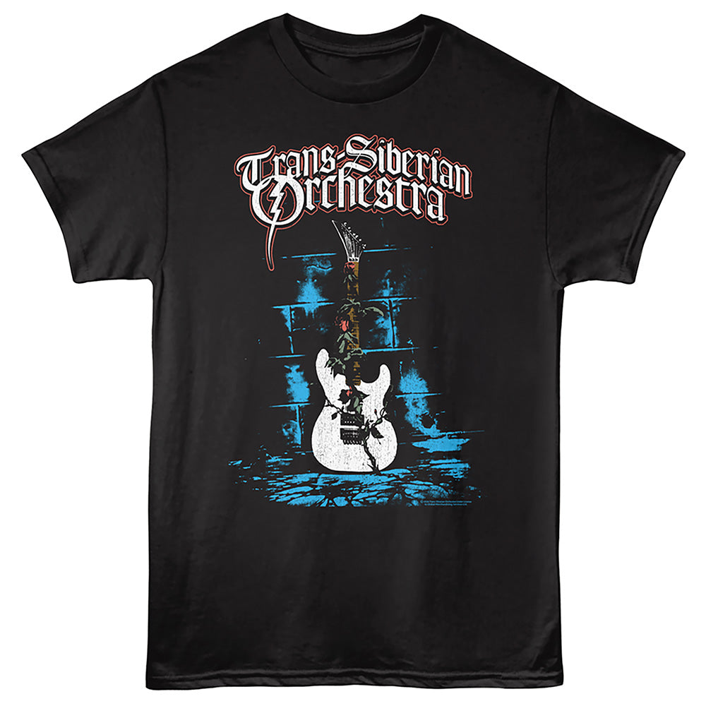 A black short-sleeve graphic t-shirt featuring the text 'Trans-Siberian Orchestra' in a stylized white and red font above an illustration of a white electric guitar with a rose and a conductor standing on top, set against a blue grunge-style background.