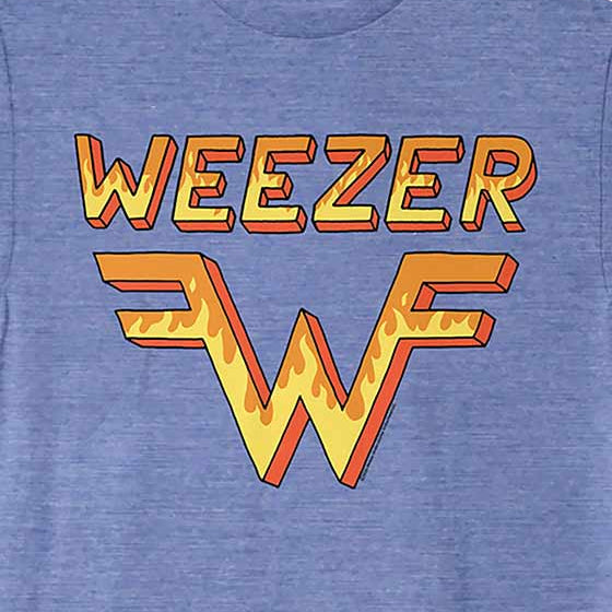 A heather blue crewneck t-shirt featuring a graphic print of the word 'WEEZER' in orange and yellow block letters above a stylized 'W' logo with flame details, shown on a plain blue background.